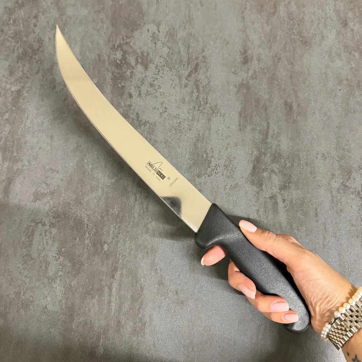 coltello_sezionare_cm__ma_3-1.webp COLTELLO SEZIONARE 26CM - MAGLIONERO -